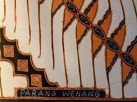 A close up of Javanese batik with a Parang Wenang pattern. Indonesian batik. photo