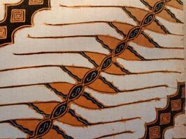 Batik pattern background. A close up of Javanese batik with a Parang Wenang pattern. Indonesian batik photo