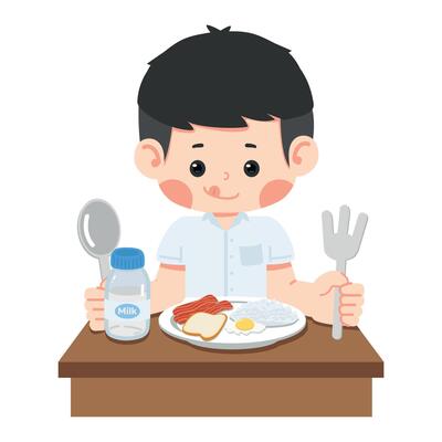 kid student is sitting at the table