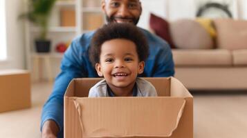 Laughing african american toddler enjoying box ride with father portrait image. Black family activity, quality time photography human scene. Parenting moment concept photo-realistic photo