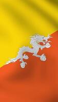 Vertical, portrait, waving national flag of Bhutan. Smooth animation with highly detailed, realistic animated background for social media, screens smartphone. Official colors cloth motion video