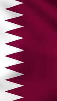 Vertical, portrait, waving national flag of Qatar. Smooth animation with highly detailed, realistic animated background for social media, screens smartphone. Cloth motion, official colors. video