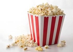 Red and White Striped Popcorn Box Isolated on White Background. photo