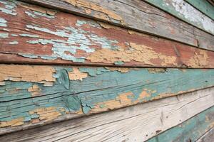 Peeling Paint on Wooden Surface with Rustic Texture. photo