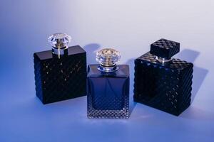 Collection of High-End Perfume Bottles with Soft Light Background photo
