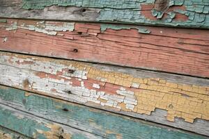 Peeling Paint on Wooden Surface with Rustic Texture background. photo