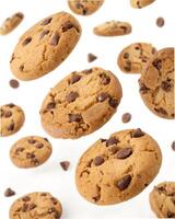 Delicious Chocolate Chip Cookies in Round Shape Floating Isolated on White Background. photo
