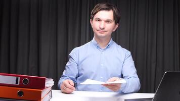 Office worker offering contract and making inviting hand gesture video