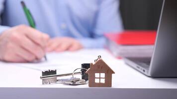 Real estate agent signing a contract for a new house purchase video