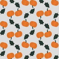 a delightful pattern featuring vibrant orange pumpkins paired with dark green, holly-like leaves, all set against a soft gray backdrop. vector