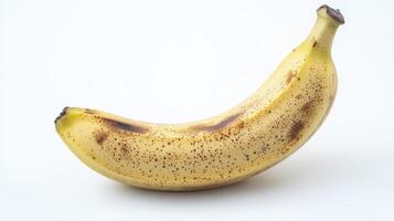 Ripe Banana with Brown Spots on White Background photo
