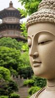 Serene Stone Buddha Statue Amidst Lush Greenery and Pagoda photo