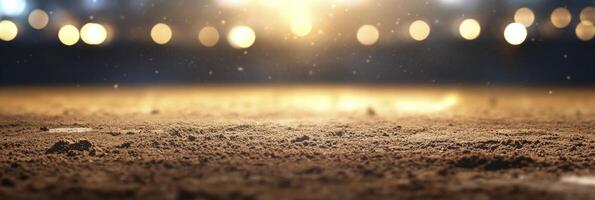 A close up of a dirt field with lights photo