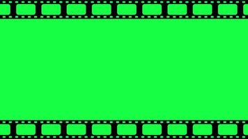 Animated of a film strip that is above and below the frame and runs from left to right on green screen. video