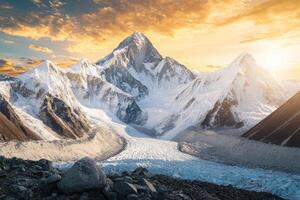 Snow Capped Mountain Peaks under Golden Sky with Ice and Rugged Terrain photo