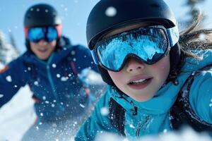 Snowboarder in helmet and goggles having fun on fresh snow in mountains photo