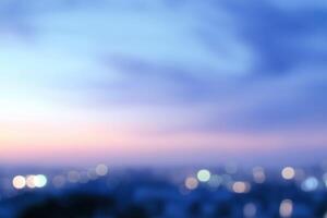 Blurred view of cityscape at twilight time, abstract background. photo