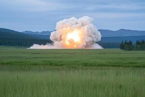 explosion in the steppe with a mountain range in the background photo