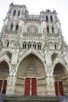 Amiens Cathedral facade with ornate Gothic design photo