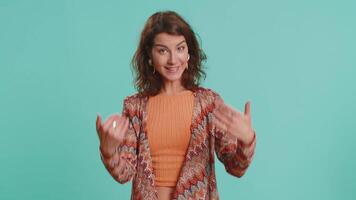 Woman showing inviting gesture with hands, ask to join, beckoning to coming, gesturing hello goodbye video