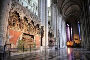 Intricate stone carvings and stained glass. Cathedral, Amiens. France 17.02.2025 photo