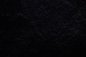 Background with a black stone texture. With space to copy. A place to add text or design photo