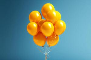 Yellow color bunch balloons on on light blue background. photo