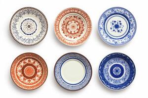 Top view of round ceramic plates, tableware blue, orange dish isolated on white background. Set or collection. Six plates. photo