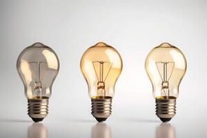 Set or collection of three light bulbs. Different colors. Isolated on white background. photo
