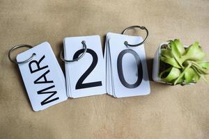 Date 20th of March on the calendar. photo