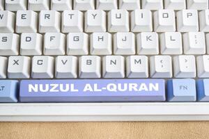 Nuzul al-Quran is mean - The Revelation of the Quran button on the keyboard photo