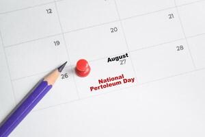 August 27. writing text National Pertoleum Day on calendar date. Save the date. Day of the year concept. photo