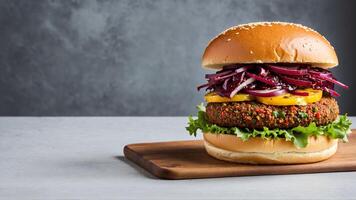 A hamburger with red cabbage, onions and lettuce photo