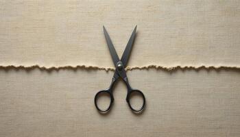 Craft Scissors on Textured Fabric Background with Torn Edge photo