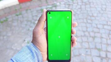 Creating a Green Screen Effect with a Smartphone in a Sunny Area video
