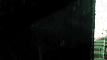 Dust particles. Man walks in a dark corridor with a kerosene lamp video