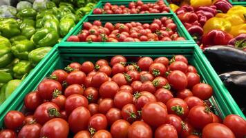 Fresh tomatoes and vegetables displayed in local market stalls video