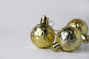 Three Gold Christmas Ball Ornaments with Texture photo