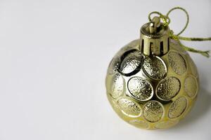 Gold Christmas Ball Ornament with Textured Design photo