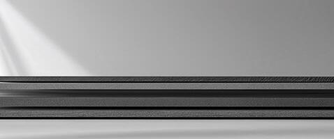 Horizontal layers of textured dark gray material create depth. photo