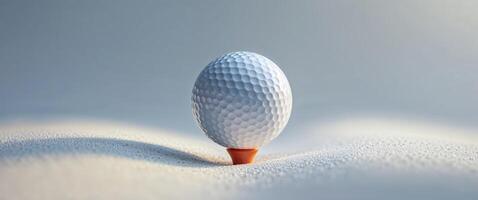 Ready for the swing a closeup of a golf ball on a tee. photo