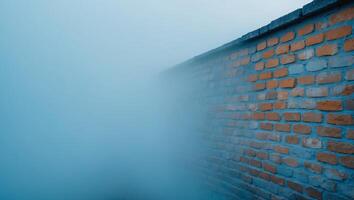 Brick wall with a blue background and a foggy mist photo