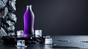 Purple Beverage Bottle with Ice Cubes on a Dark Textured Background in a Studio Setting photo