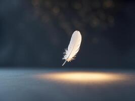 A feather floating in the air on a dark surface photo