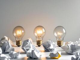 Three light bulbs with different colors on a white background photo