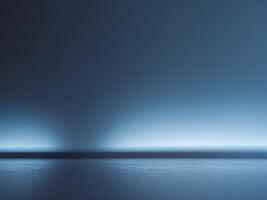 An empty room with a dark floor and a light photo