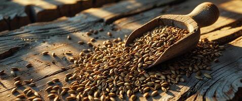 Wooden scoop with hemp seeds on rustic wood surface photo
