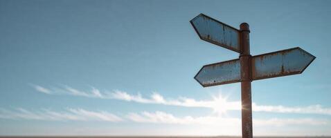 Empty signpost showing two opposite directions in a sunny day photo
