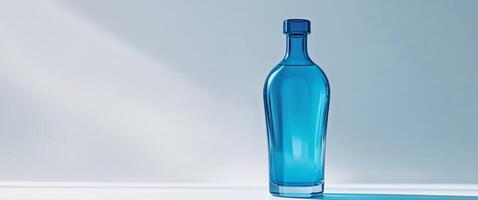 Stunning bottle of blue liquid displaying a refreshing appearance inviting customers to engage with creativity. photo