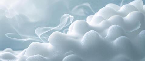 Soft white foam texture with subtle light blue accents for design and backgrounds photo